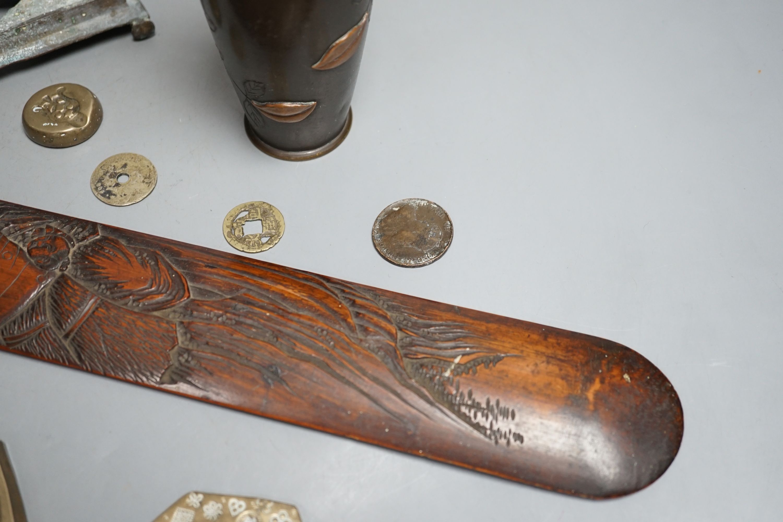 A collection of Japanese and Indian objects, largest page Turner, 46cms long.